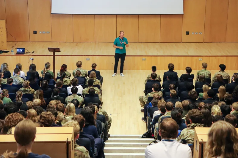 Patrick Foster delivering a talk in a lecture theatre